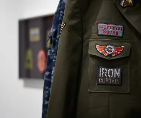 "An Abridged Sonic History of Global Conflict" - detail - Embroidery on army surplus