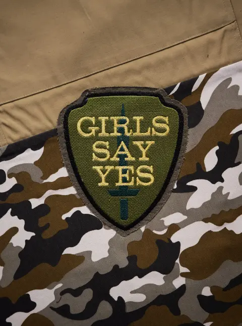 "An Abridged Sonic History of Global Conflict" - detail "Vietnam War (Girls Say Yes)" - Embroidery on quilted army surplus - patch 7"x6"
